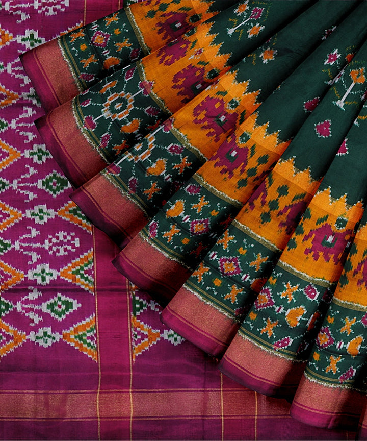 Dark green pink handwoven pochampally ikat silk saree