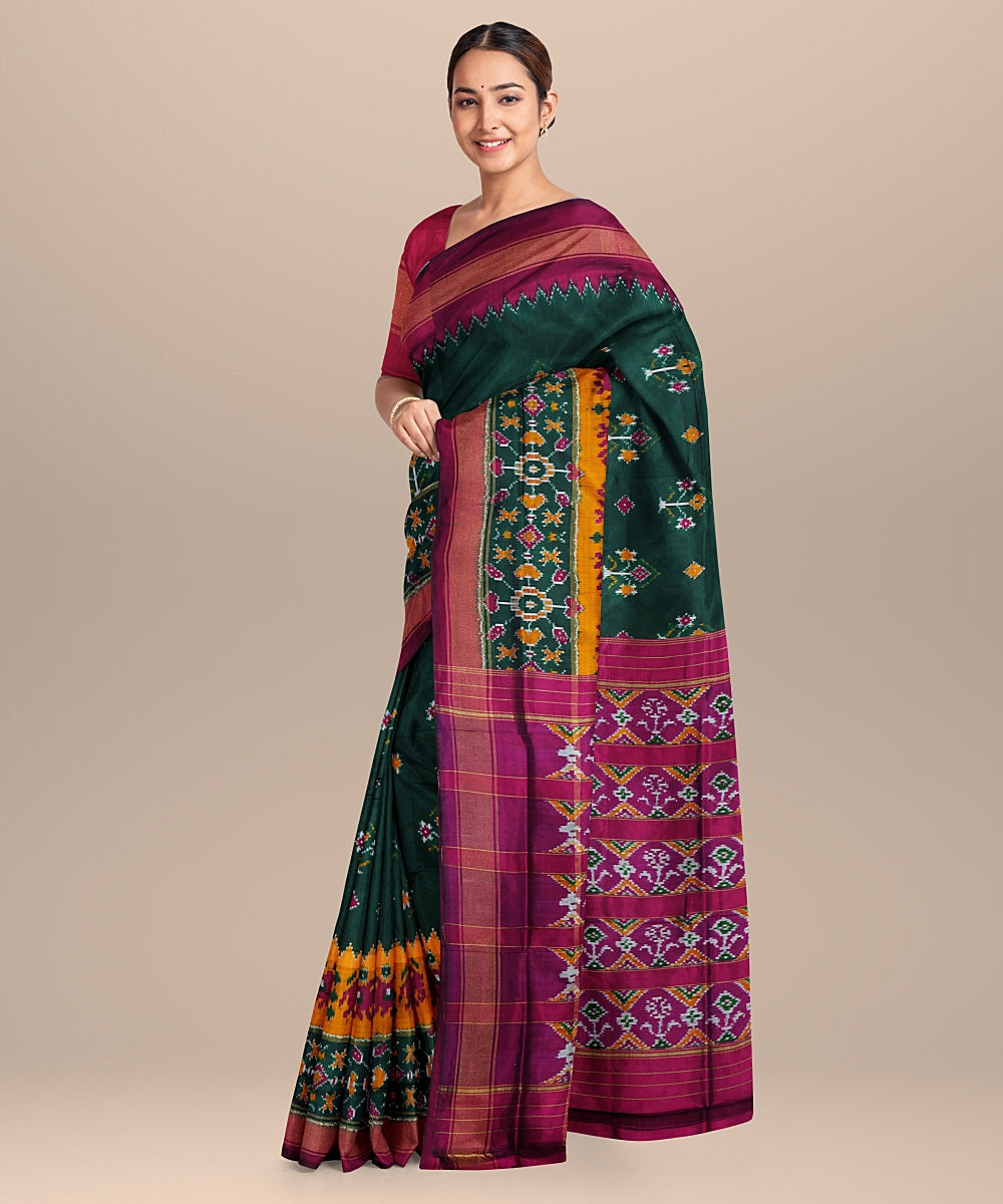 Dark green pink handwoven pochampally ikat silk saree