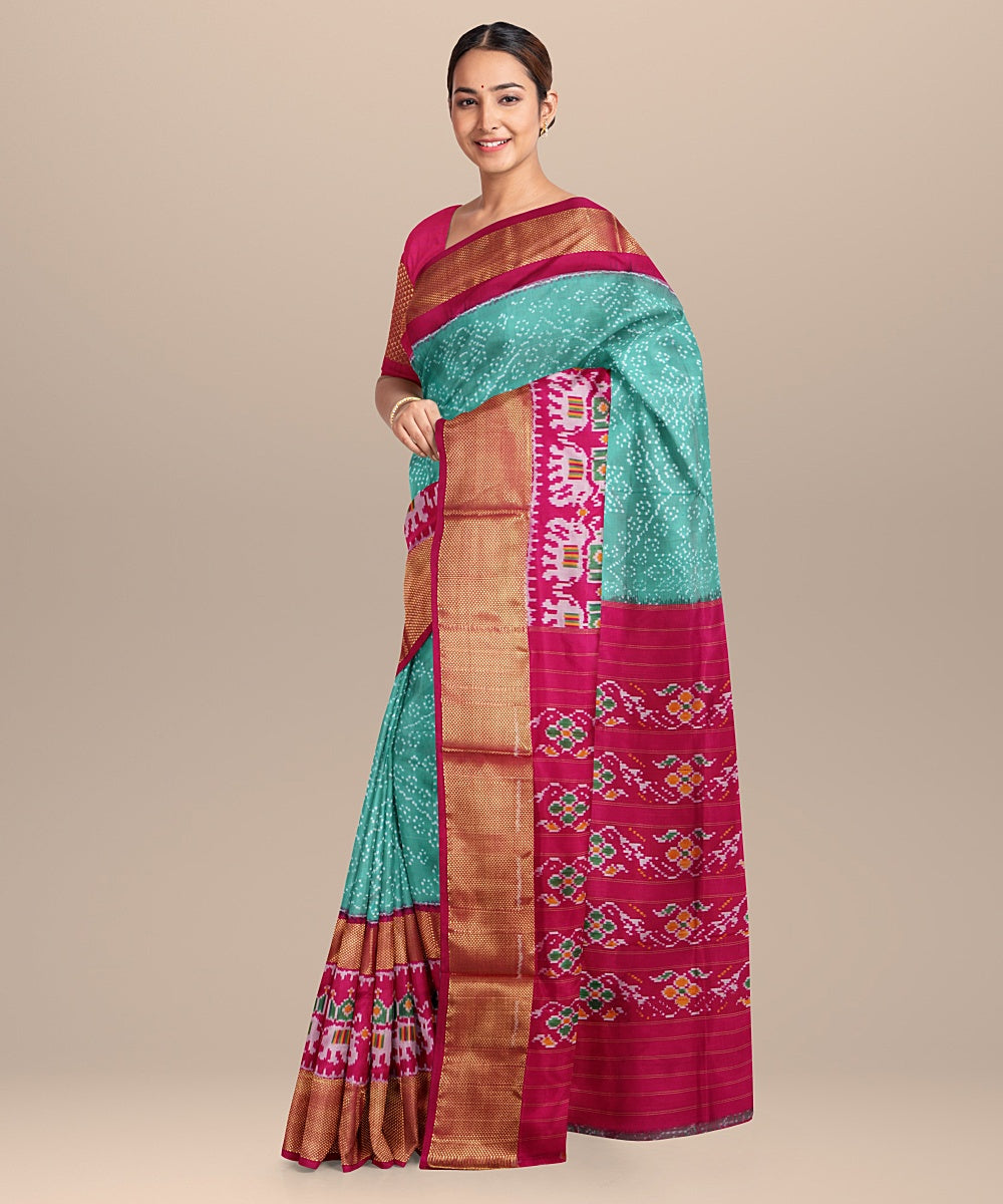 Sea green pink handwoven pochampally ikat silk saree