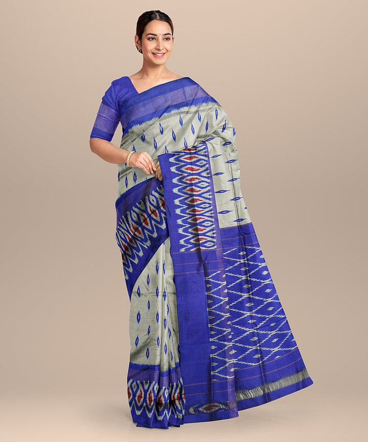 Cream blue handwoven pochampally ikat silk saree