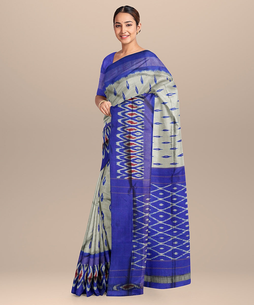 Cream blue handwoven pochampally ikat silk saree