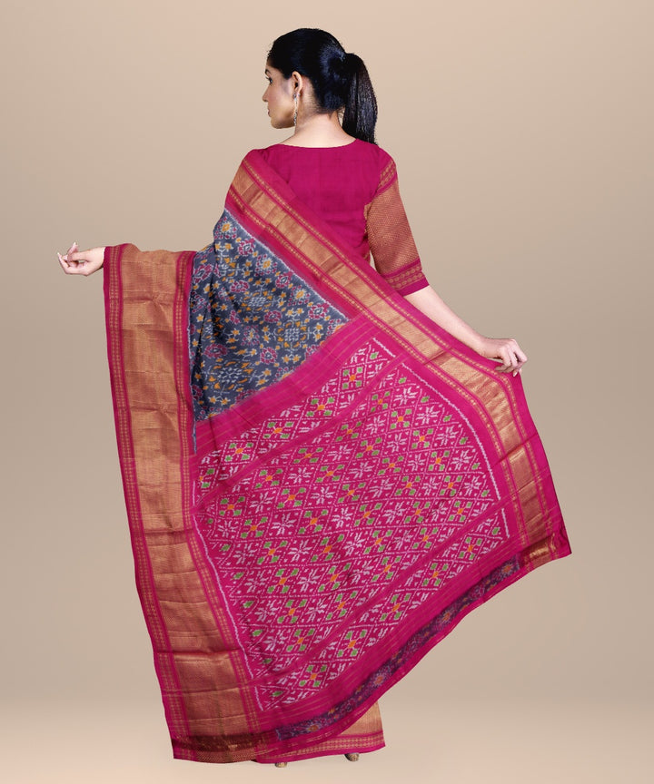 Dark green pink handwoven pochampally ikat silk saree