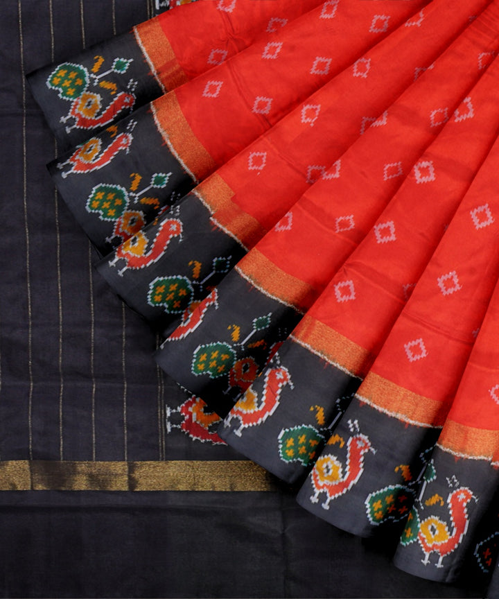 Orange black handwoven pochampally ikat silk saree