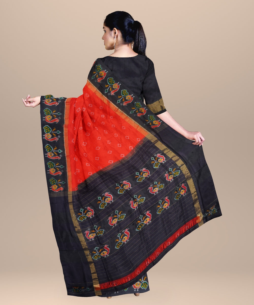 Orange black handwoven pochampally ikat silk saree