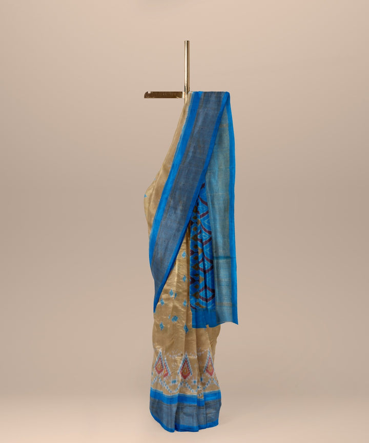 Beige neon blue handwoven pochampally ikat silk saree