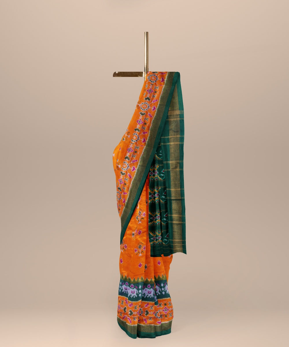 Orange dark green handwoven pochampally ikat silk saree