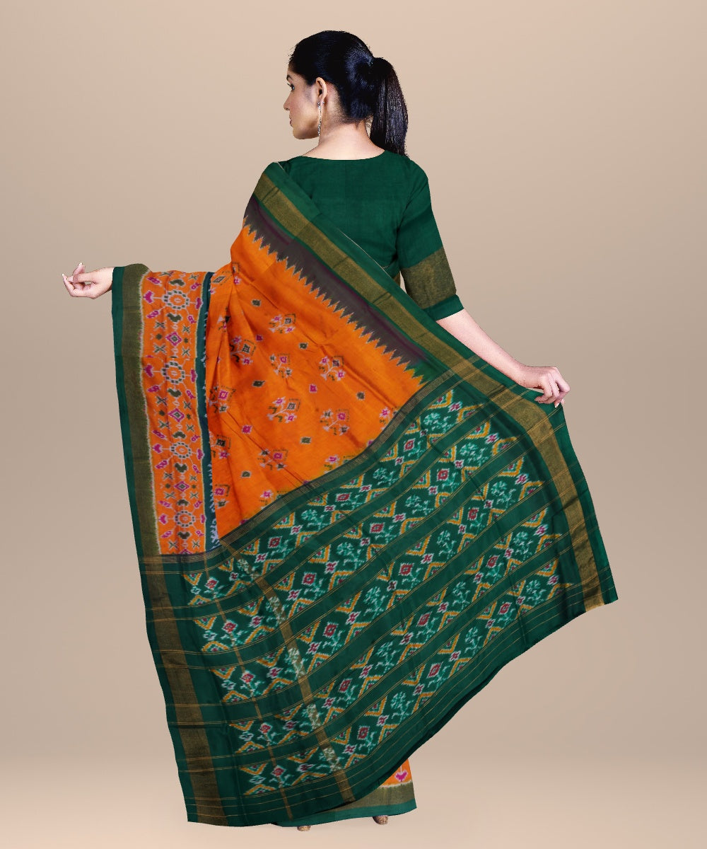 Orange dark green handwoven pochampally ikat silk saree