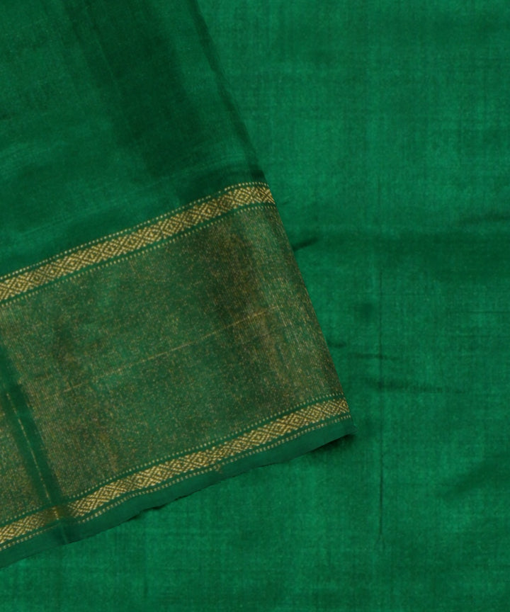 White dark green handwoven pochampally ikat silk saree