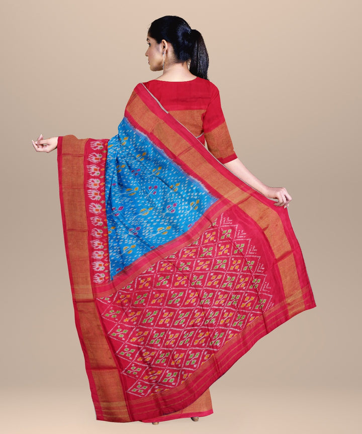 Bright blue ruby red handwoven pochampally ikat silk saree