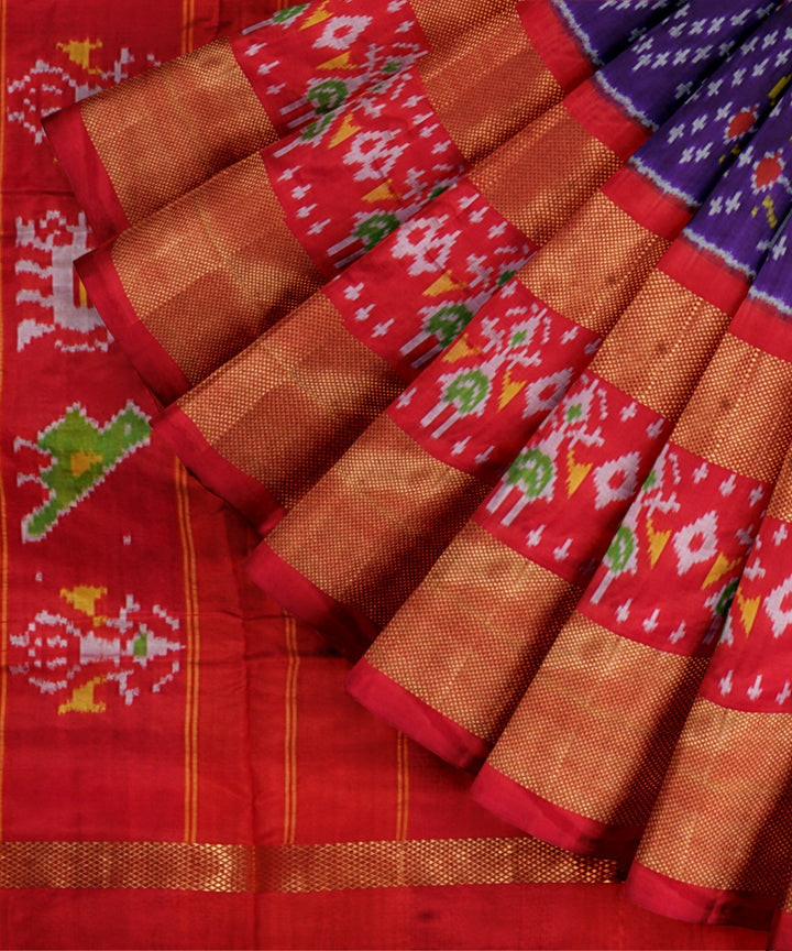 Navy blue orange handwoven pochampally ikat silk saree