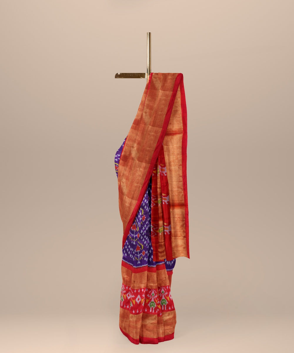 Navy blue orange handwoven pochampally ikat silk saree