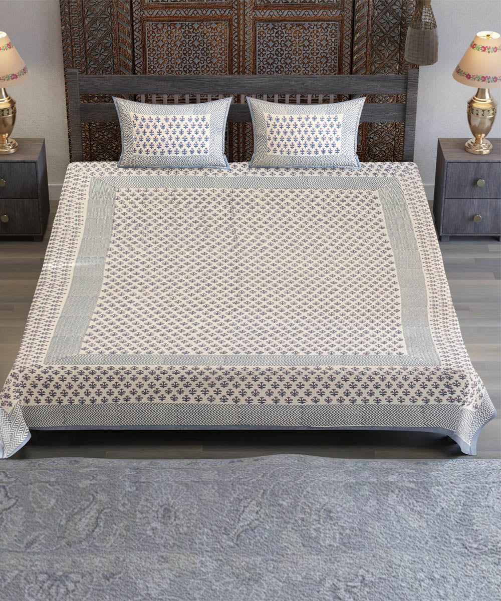 White base yellow flower motif hand block printed cotton bedsheet