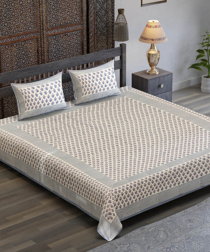 White base yellow flower motif hand block printed cotton bedsheet