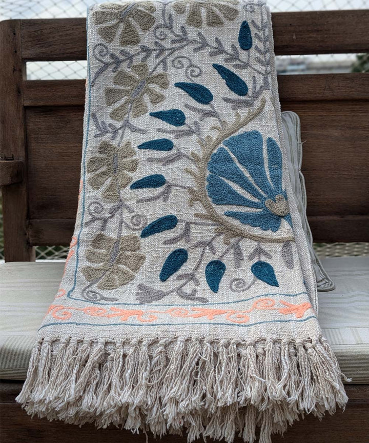 Beige blue hand embroidered slub cotton block printed throw