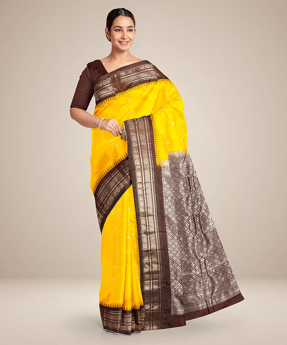 Yellow black handwoven gadwal silk saree