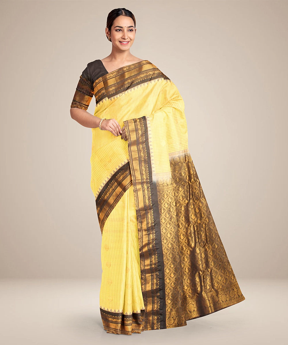 Light yellow black handwoven gadwal silk saree