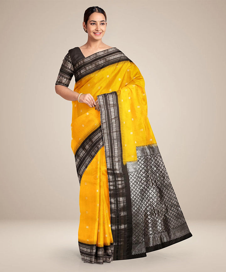 Yellow black gadwal silk handwoven saree