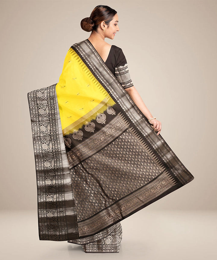 Yellow black handwoven gadwal silk saree