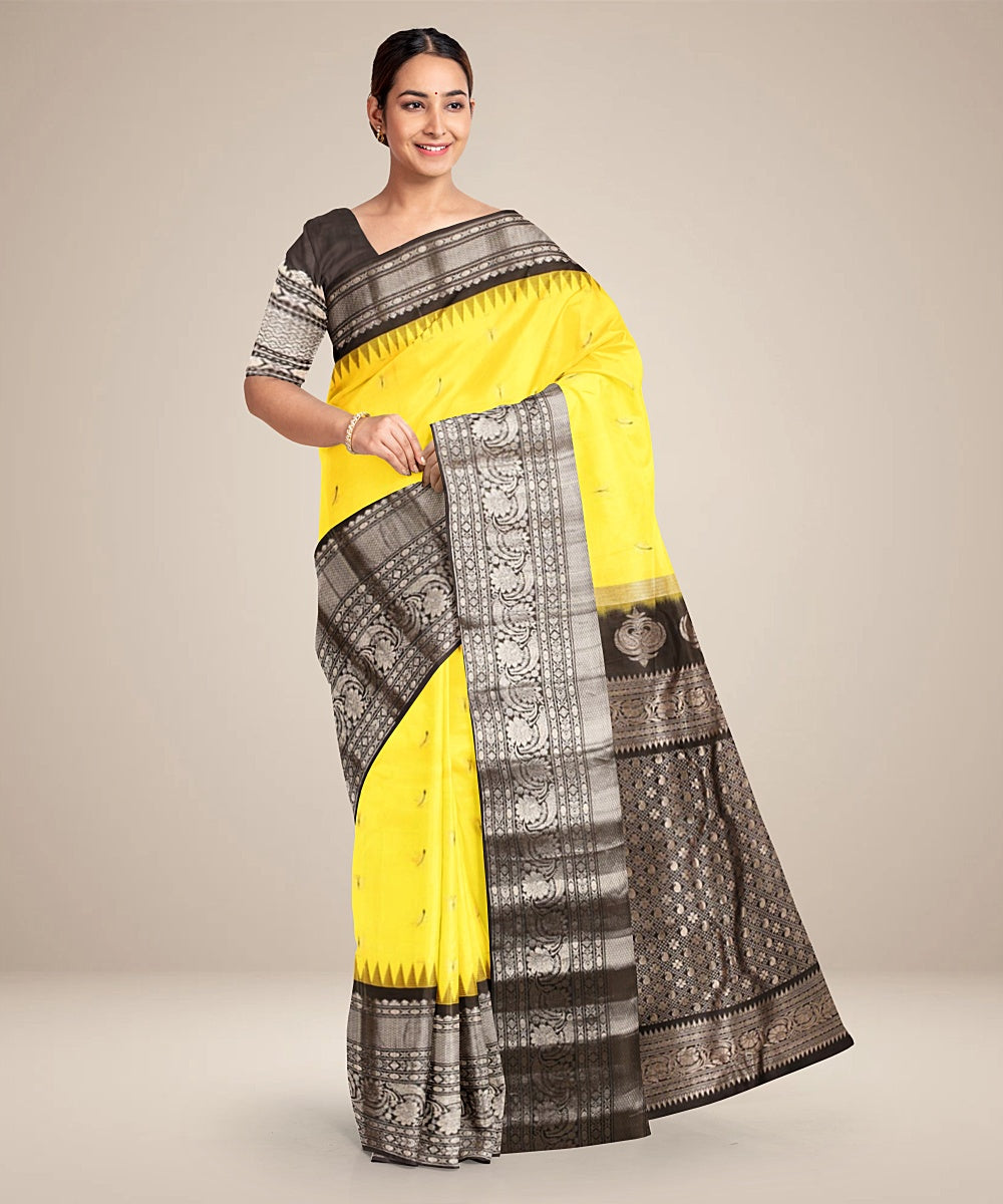 Yellow black handwoven gadwal silk saree