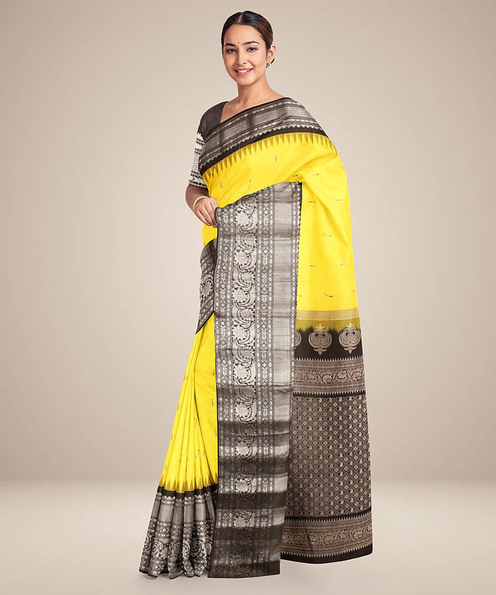 Yellow black handwoven gadwal silk saree