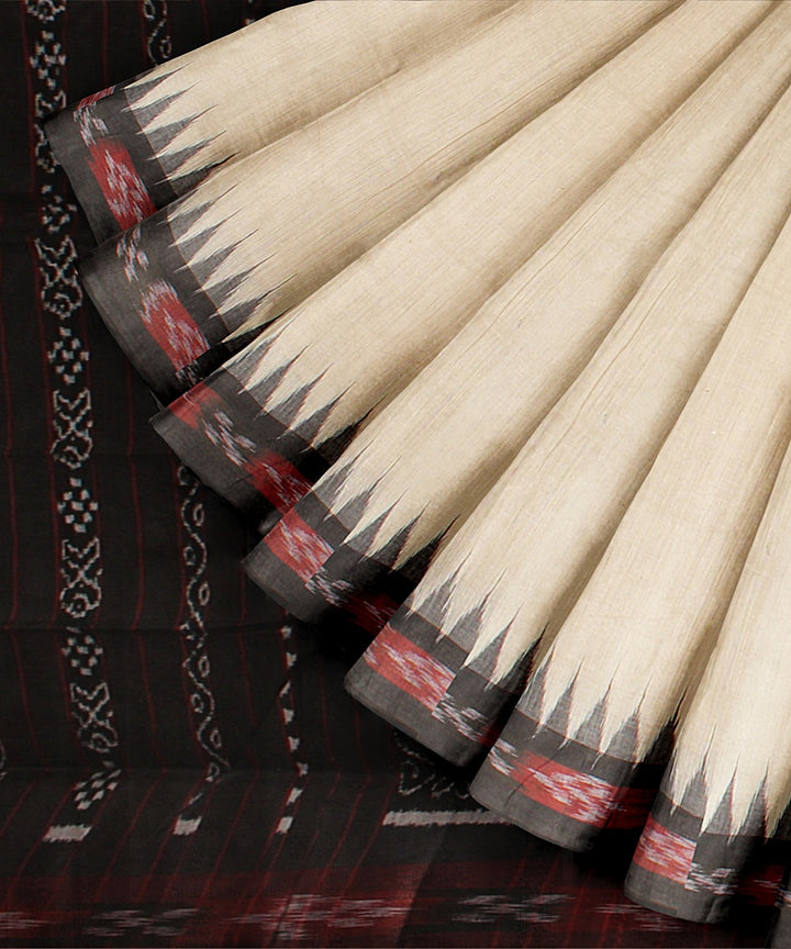 Offwhite black tussar silk handloom odisha ikat saree