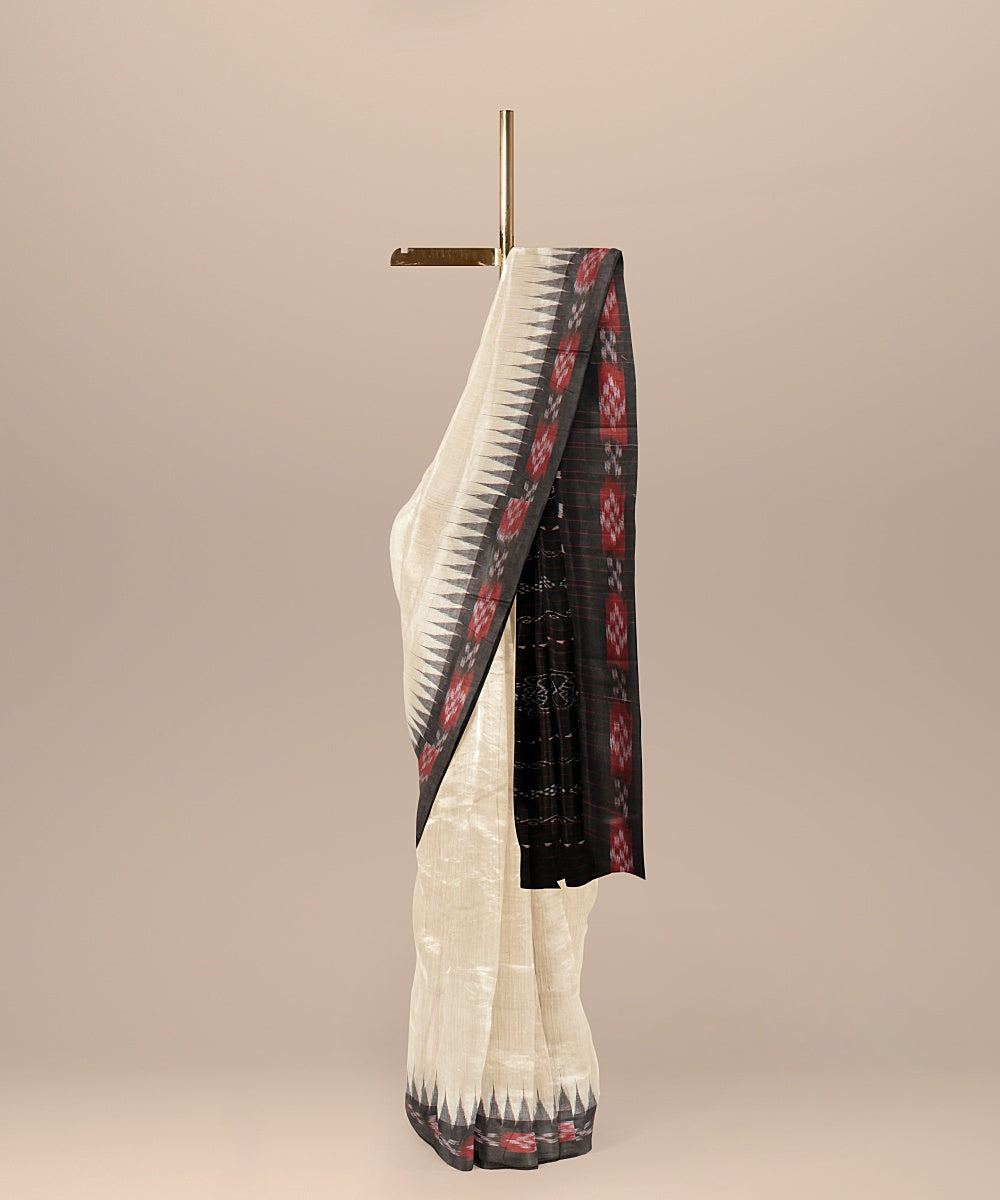 Offwhite black tussar silk handloom odisha ikat saree