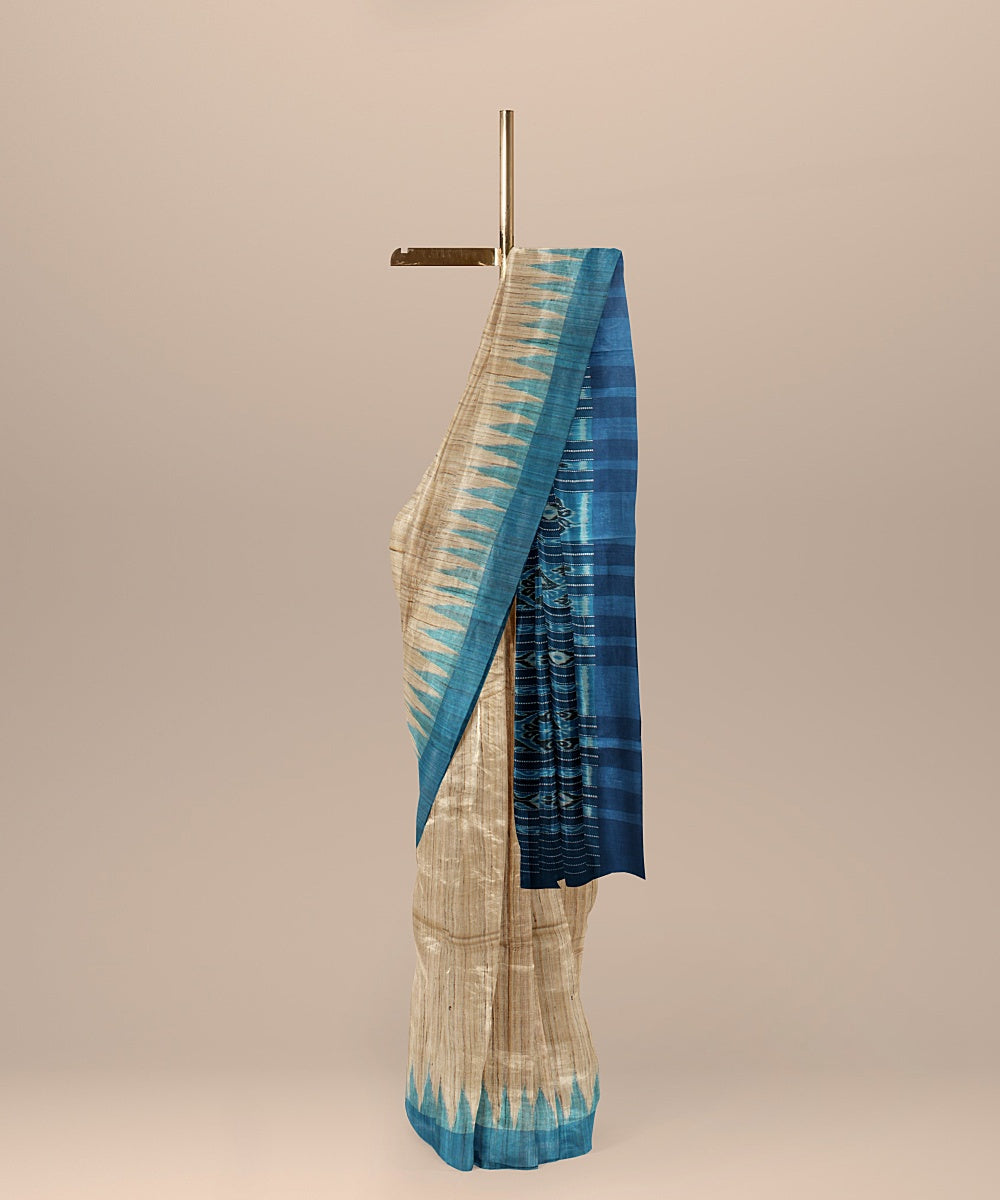 Beige turquoise blue tussar silk handloom odisha ikat saree