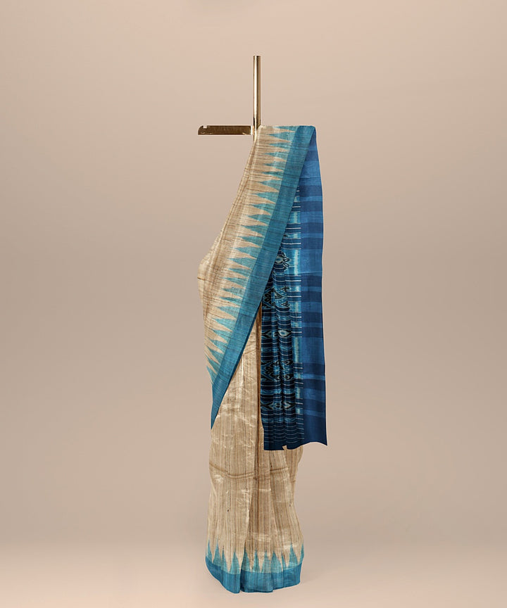 Beige turquoise blue tussar silk handloom odisha ikat saree