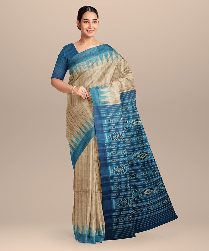 Beige turquoise blue tussar silk handloom odisha ikat saree