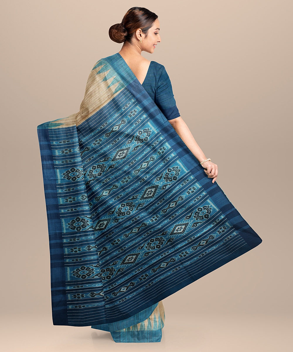 Beige turquoise blue tussar silk handloom odisha ikat saree