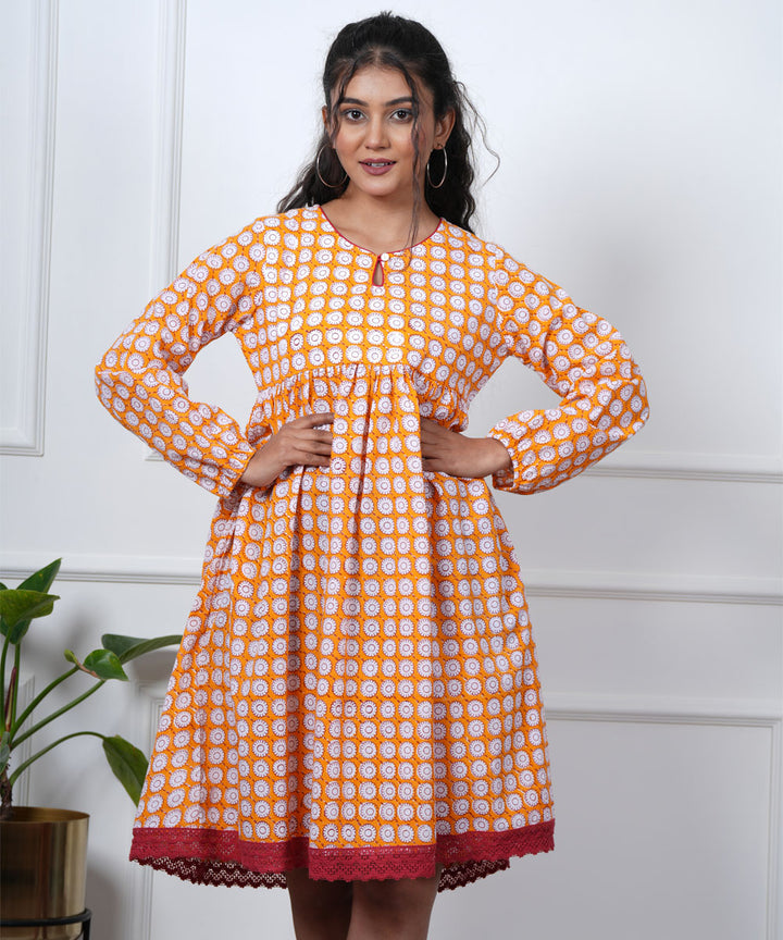 Orange symmetrical handblock printed cotton dress