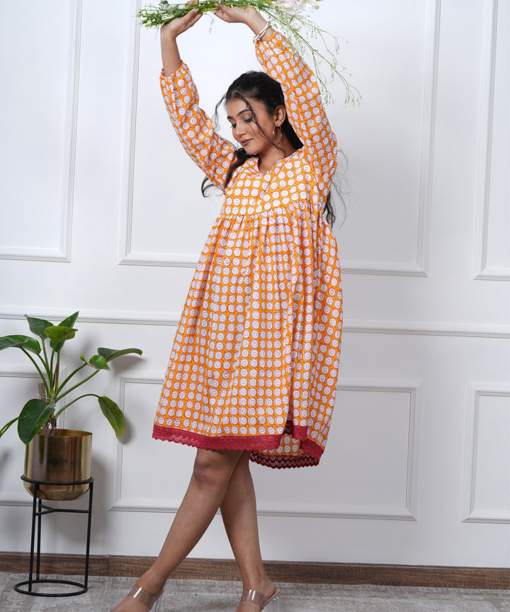 Orange symmetrical handblock printed cotton dress