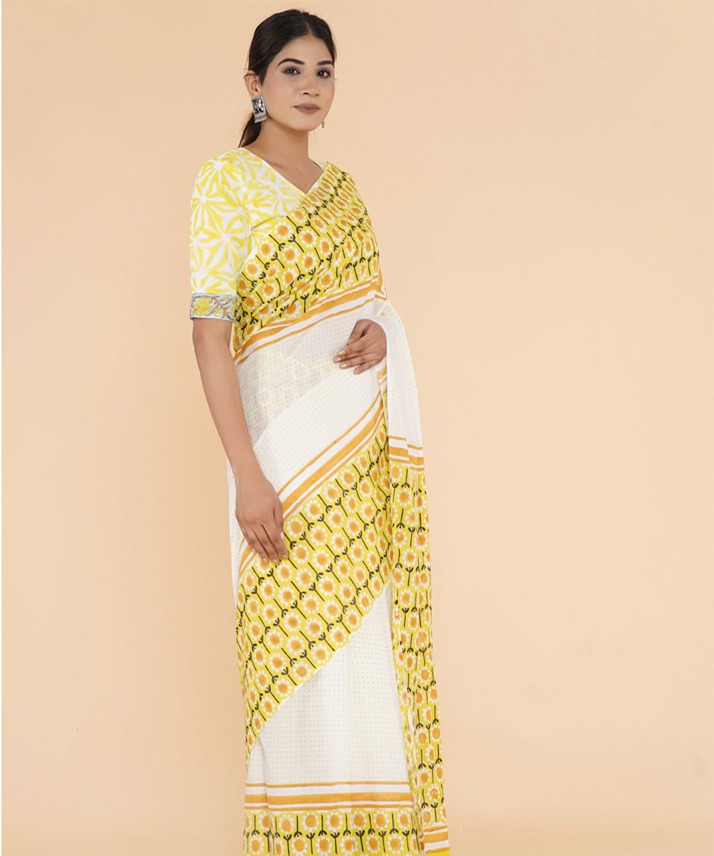 Yellow white hand sanganeri printed cotton saree