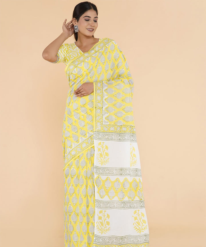 Yellow offwhite hand sanganeri printed cotton saree