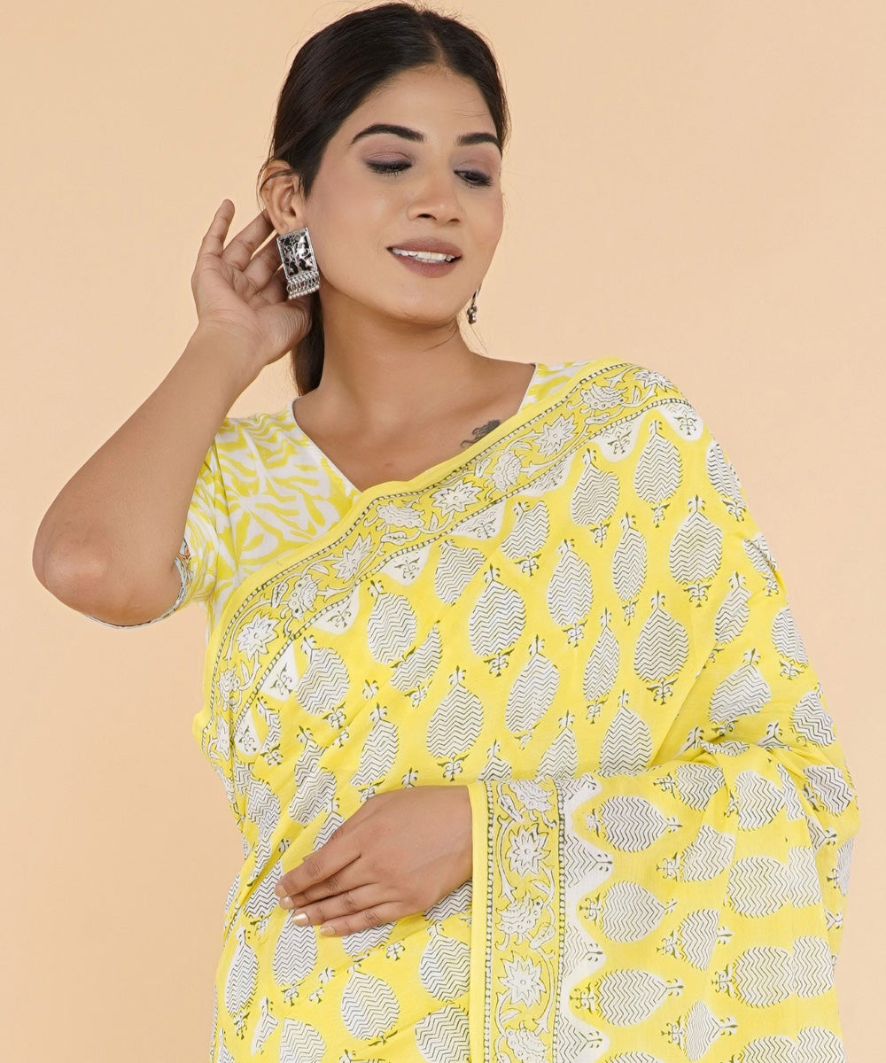 Yellow offwhite hand sanganeri printed cotton saree