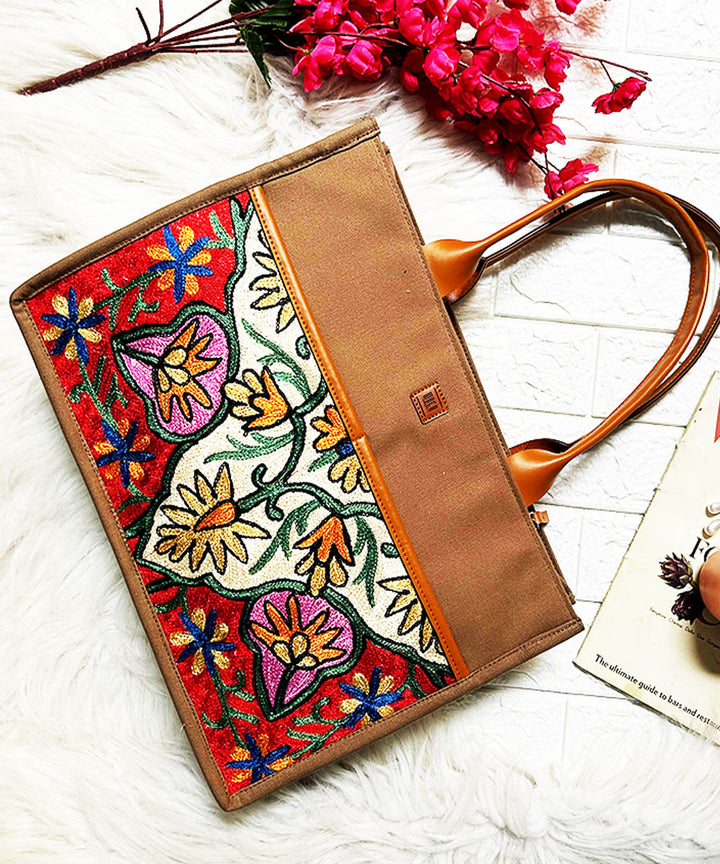 Beige hand embroidered kashmiri canvas hand bag