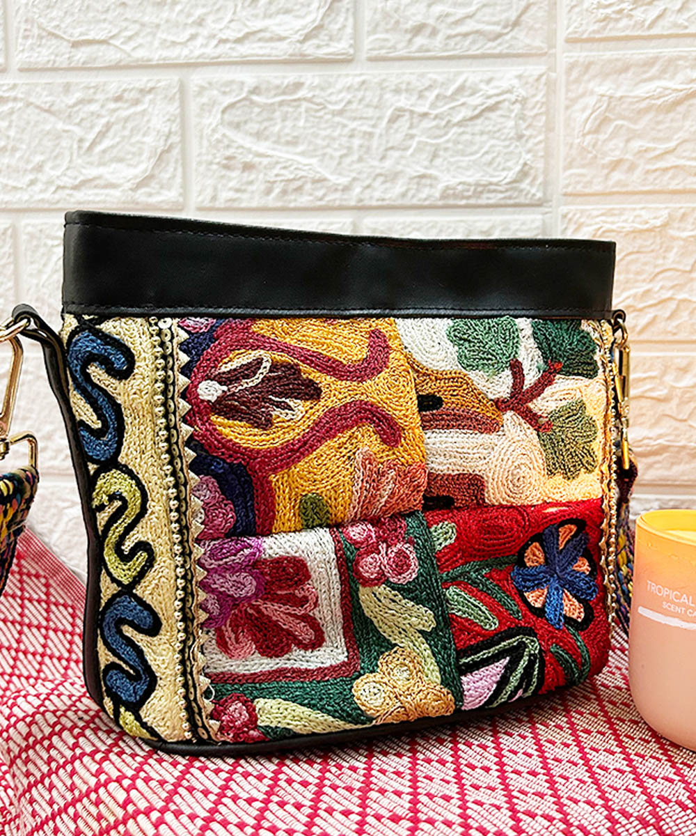 Multi color hand embroidered kashmiri canvas sling bag