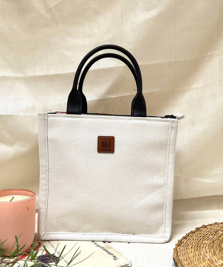 White hand embroidered kashmiri canvas sling bag
