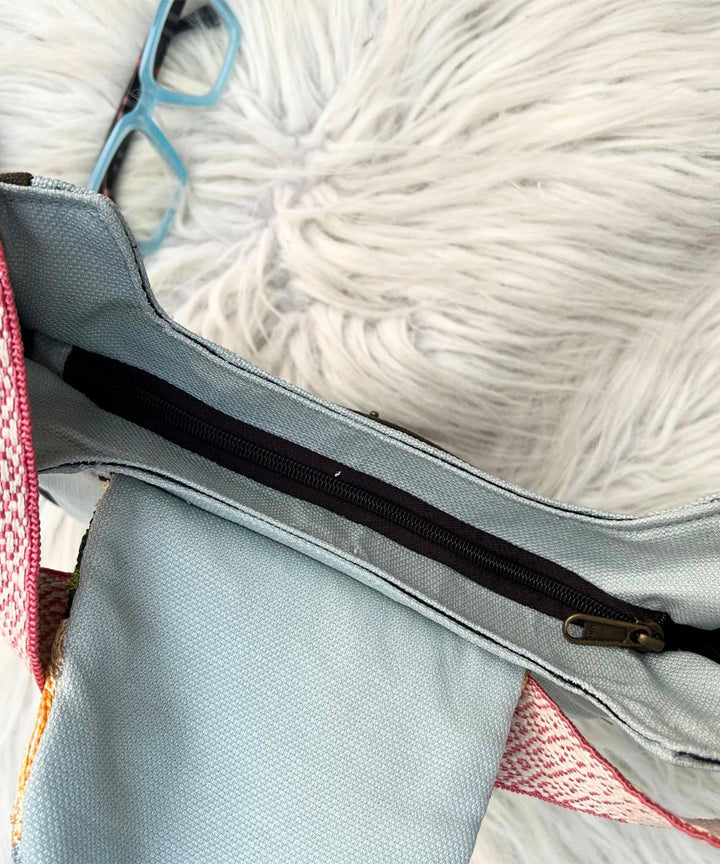 Sillica pastel blue hand embroidered kashmiri canvas saddle bag