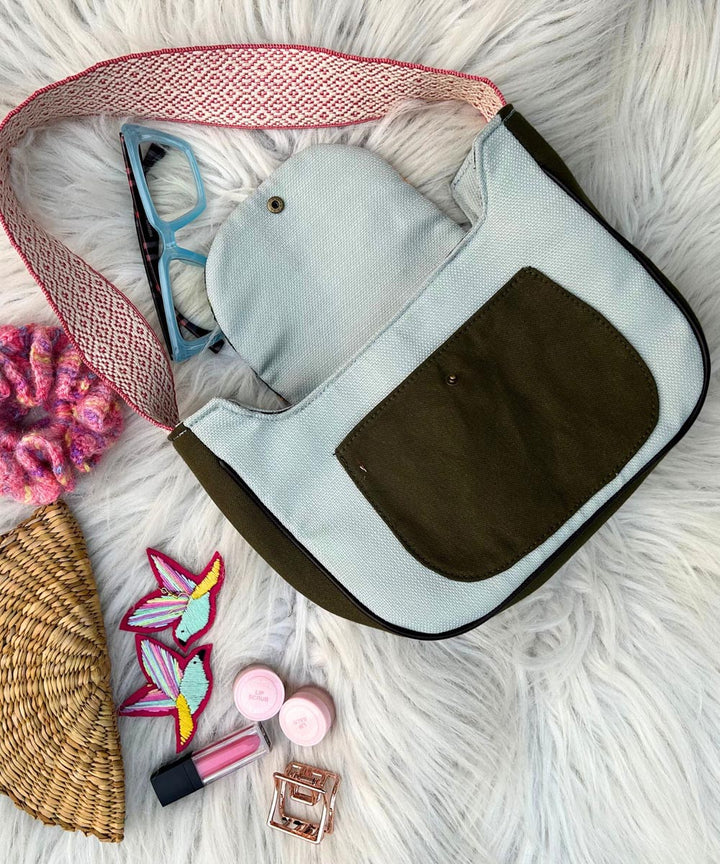Sillica pastel blue hand embroidered kashmiri canvas saddle bag