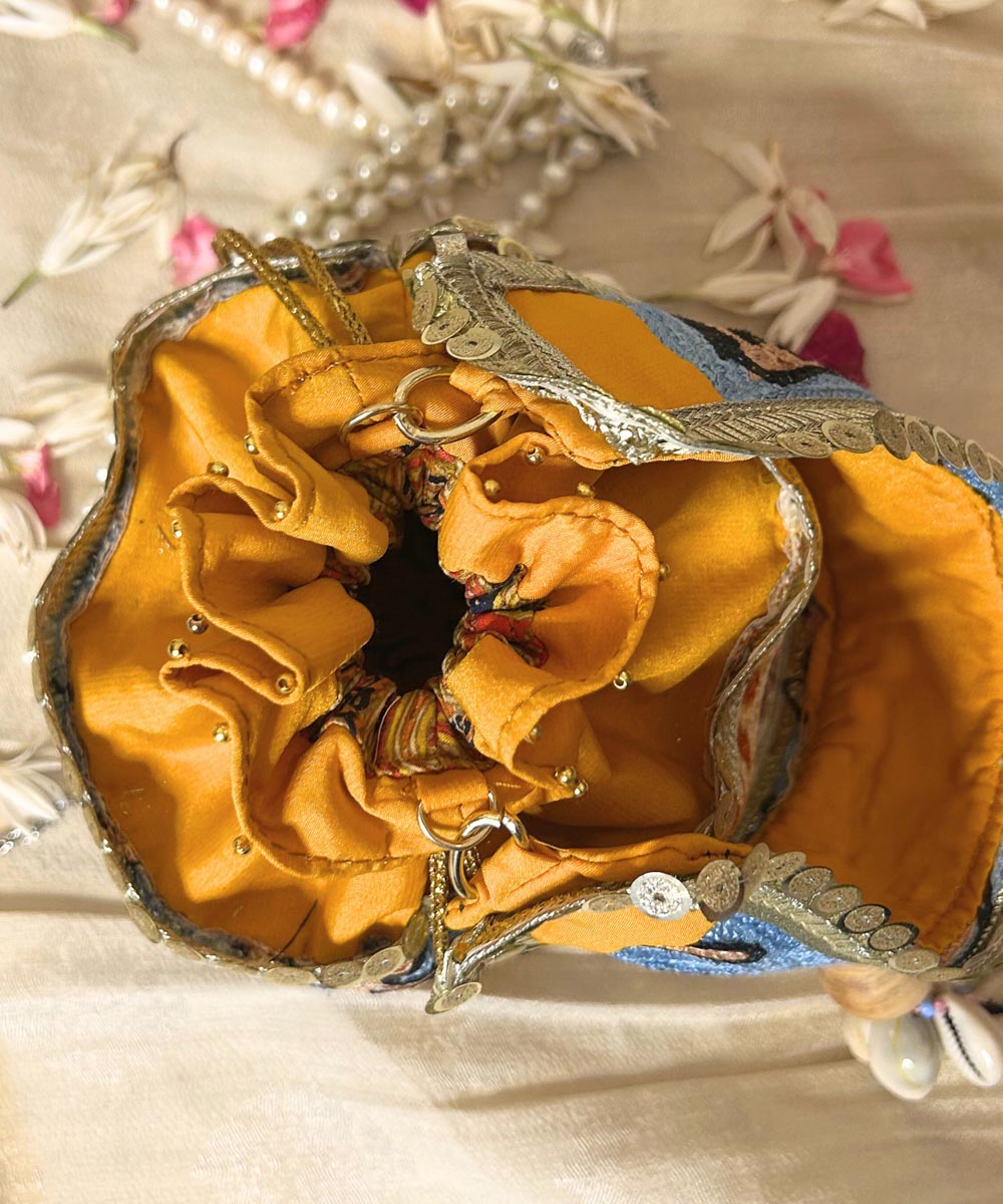 Lemon yellow hand embroidered kashmiri potli bag