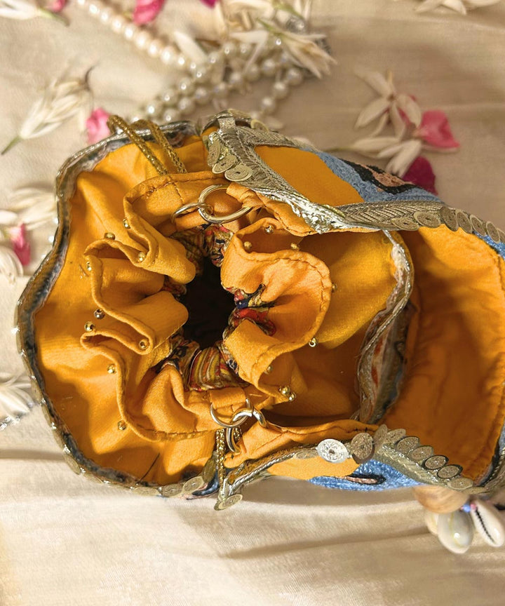 Lemon yellow hand embroidered kashmiri potli bag