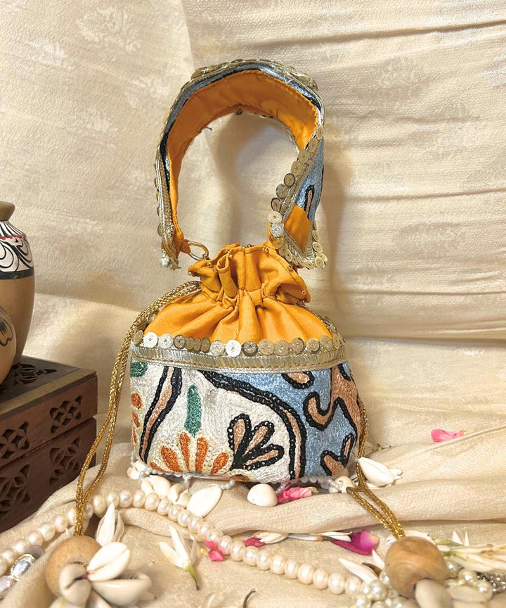 Lemon yellow hand embroidered kashmiri potli bag