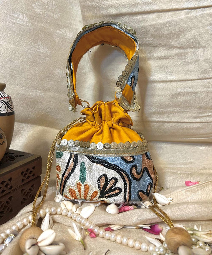 Lemon yellow hand embroidered kashmiri potli bag