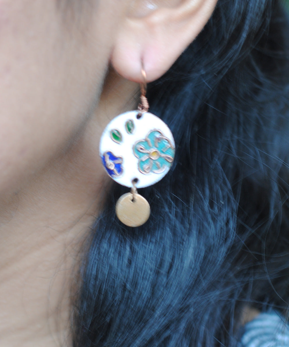 White handcrafted flower motif copper enamel earring