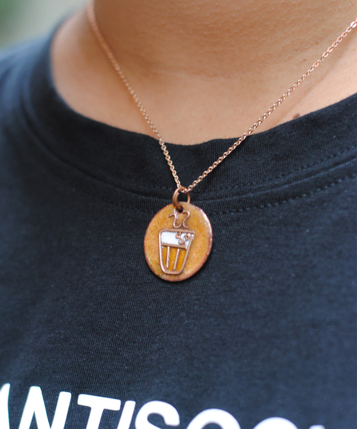 Golden handcrafted tea motif copper enamel pendant necklace