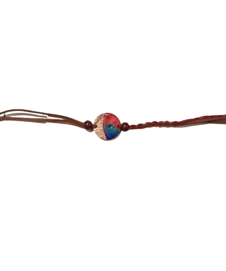 Handcrafted rudra textured copper enamel rakhi