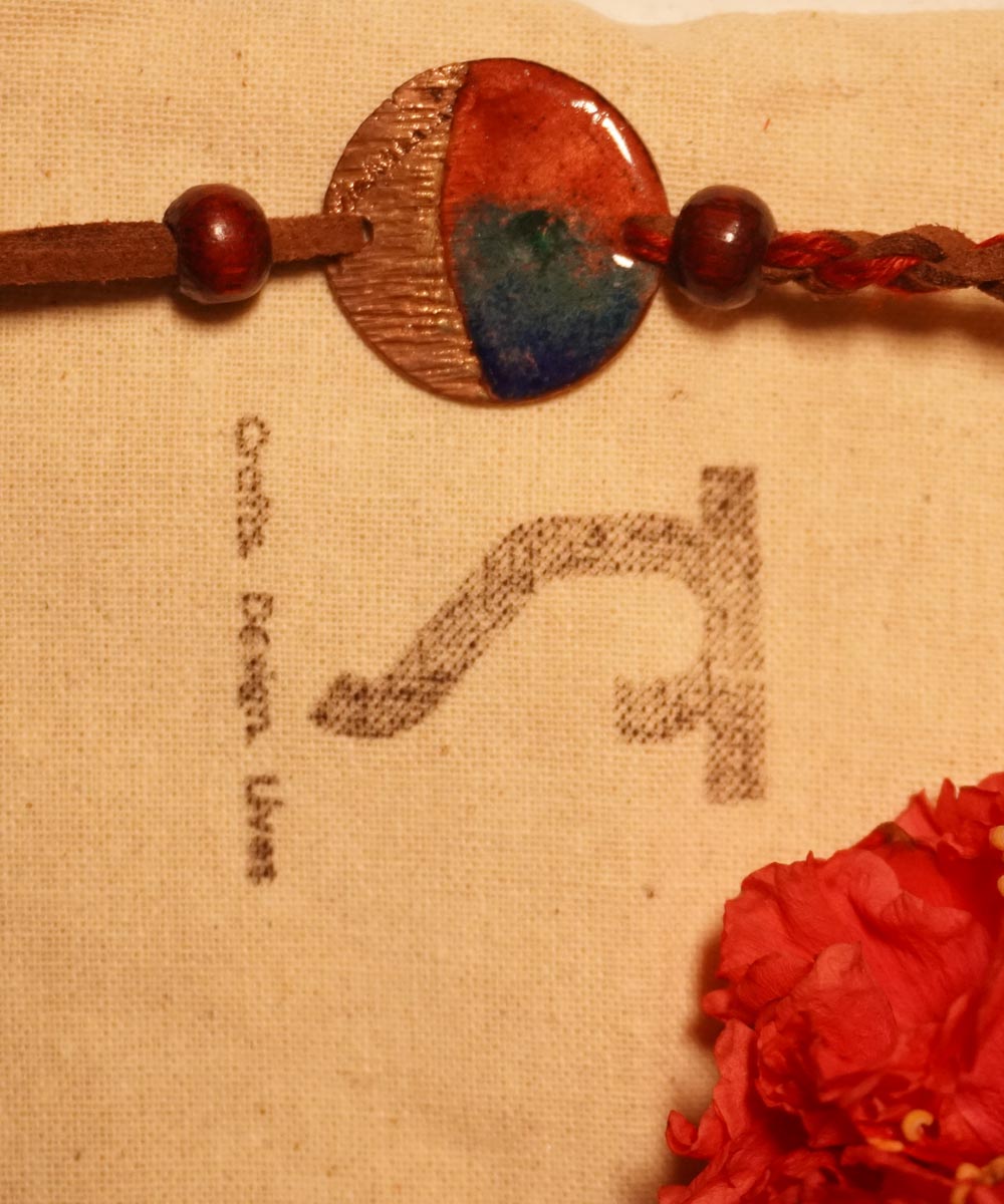 Handcrafted rudra textured copper enamel rakhi