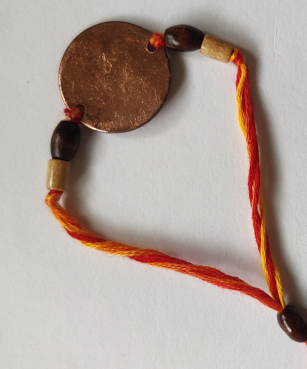 Orange hand crafted copper enamel rakhi