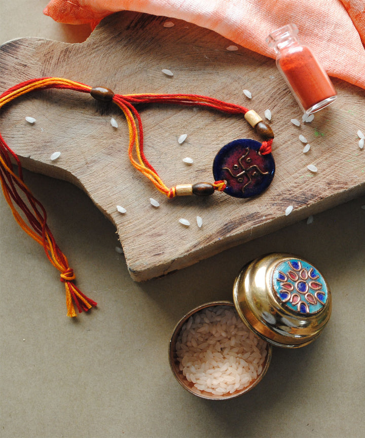 Navy blue hand crafted copper enamel rakhi
